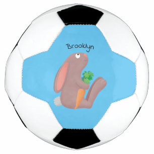Cute bunny rabbit sitting with carrot cartoon soccer ball