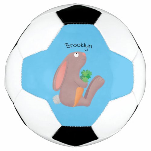 Cute bunny rabbit sitting with carrot cartoon soccer ball