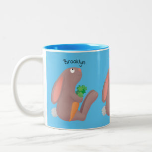 Cute bunny rabbit sitting with carrot cartoon Two-Tone coffee mug