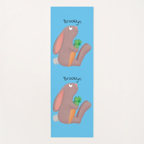 Cute bunny rabbit sitting with carrot cartoon yoga mat