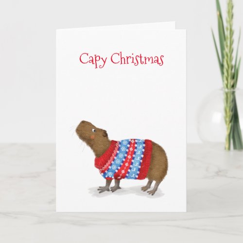 Cute capybara in a Christmas jumper card