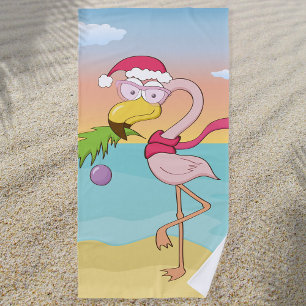 Cute cartoon Christmas flamingo on the beach Beach Towel