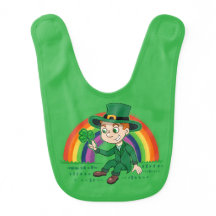 Cute cartoon leprechaun with shamrock and rainbow