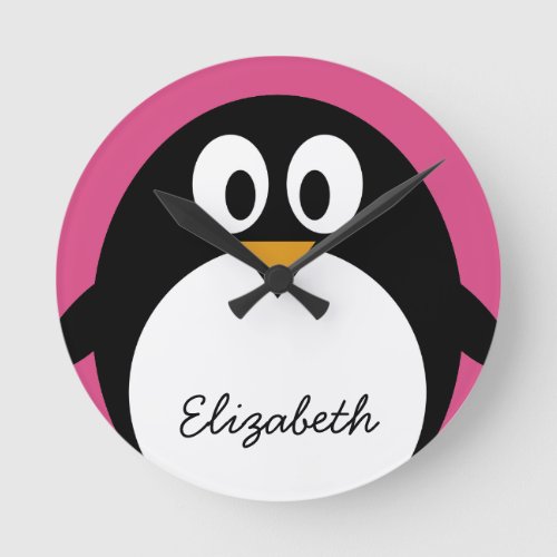 cute cartoon penguin with pink background round clock