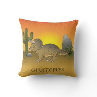 Cute Cartoon Triceratops Dinosaur In Sunset Desert Throw Pillow