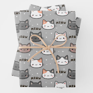 Cute cat in grey wrapping paper sheets