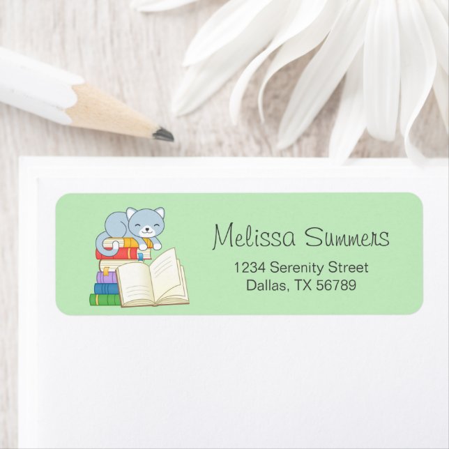 Cute Cat on top of a Book Stack on Green Label (Insitu)