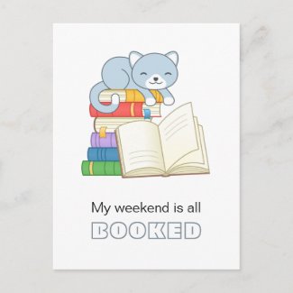 Cute Cat on top of a Book Stack Weekend Booked