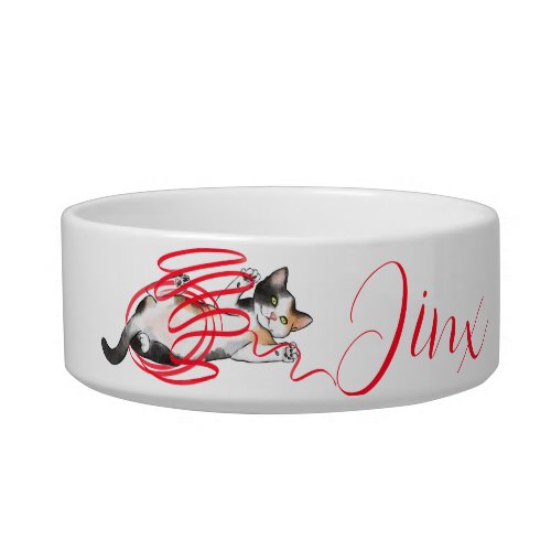 Cute Cat Playing with a Ribbon Bowl