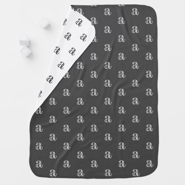 Cute charcoal grey white custom initial pattern baby blanket (In Situ)