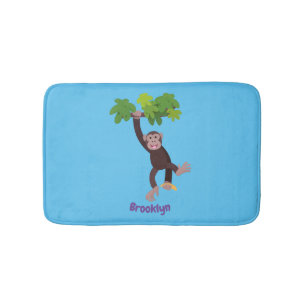 Cute chimpanzee in jungle hanging cartoon bath mat