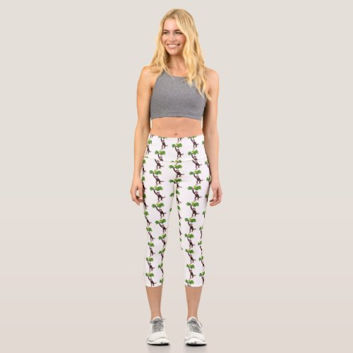 Cute chimpanzee in jungle hanging cartoon capri leggings