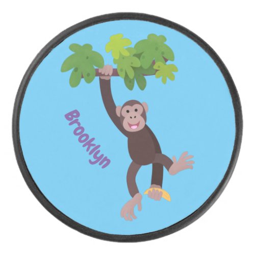 Cute chimpanzee in jungle hanging cartoon hockey puck