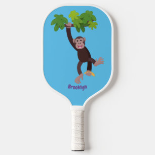 Cute chimpanzee in jungle hanging cartoon pickleball paddle