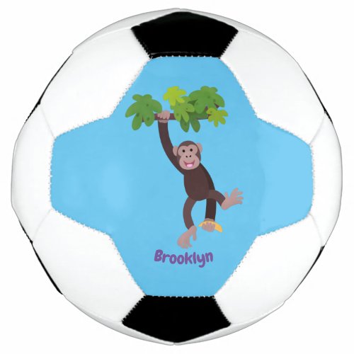 Cute chimpanzee in jungle hanging cartoon soccer ball