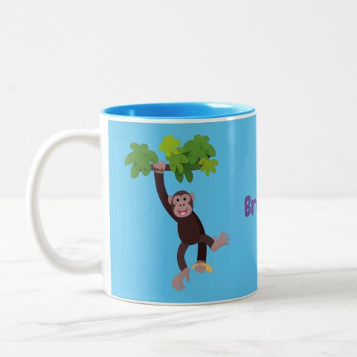 Cute chimpanzee in jungle hanging cartoon Two_Tone coffee mug