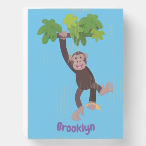 Cute chimpanzee in jungle hanging cartoon wooden box sign