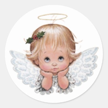 Cute Christmas Baby Angel Head In Hands Classic Round Sticker by santasgrotto at Zazzle