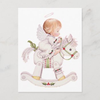 Cute Christmas Baby Angel On Rocking Horse Postcard by santasgrotto at Zazzle
