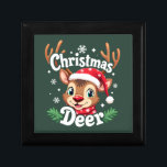 Cute Christmas Deer Illustration Gift Box<br><div class="desc">This cheerful Christmas deer design brings holiday joy with its bright, playful expression and sparkling winter details. The adorable reindeer wears a festive red Santa hat and matching snowflake scarf, surrounded by shimmering snowflakes and evergreen leaves for a cozy seasonal touch. With wide, twinkling eyes and a warm smile, this...</div>