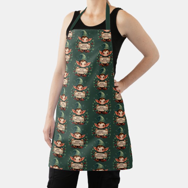 Cute Christmas Elf Holding Merry Sign Green Apron (Insitu)