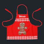 Cute Christmas Gingerbread Red Gingham Monogram Apron<br><div class="desc">This Christmas apron features a cute gingerbread girl with a border of red and white gingham.  Above is a monogram name for you to personalize.  Background is red.  Makes a great holiday apron for kids!</div>