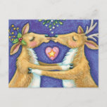 Cute Christmas Reindeer, Romantic Kiss w Mistletoe Holiday Postcard<br><div class="desc">Vintage illustration Merry Christmas design featuring a love and romance design with two adorable reindeer kissing under the mistletoe. A heart is between them. A funny,  silly and romantic cartoon design for animal lovers.</div>