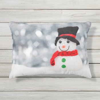 Cute Christmas Snowman Bokeh Outdoor Pillow by GiftsGaloreStore at Zazzle