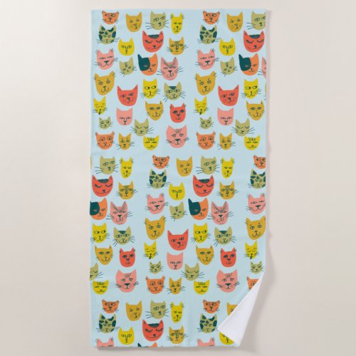 Cute colorful cats pattern on blue beach towel