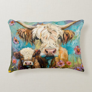 Cute colorful highland cow and calf in a meadow accent pillow