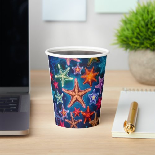 Cute colorful little starfish in sea  paper cups