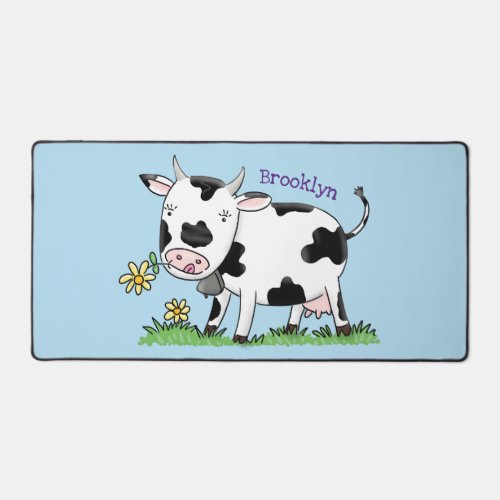 Cute cow in green field cartoon illustration desk mat