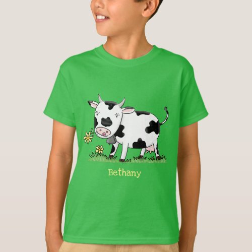 Cute cow in green field cartoon illustration T_Shirt