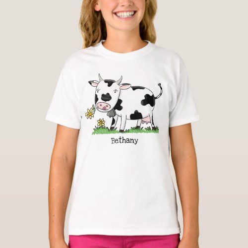 Cute cow in green field cartoon illustration T_Shirt