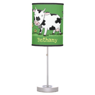 Cute cow in green field cartoon illustration table lamp