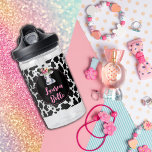 Cute Cow Pattern Pink Tropical Hibiscus Name Water Water Bottle<br><div class="desc">This cow with floral hibiscus bouquet in her hair on a black circle for your name in pink and a background cowhide pattern is sure to bring a smile to your day.  I mean who doesn't smile when they see a cow?  Composite design by Holiday Hearts Designs.</div>