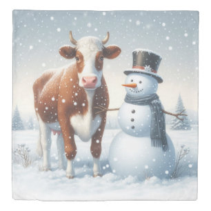 Cute cow & snowman in the winter field duvet cover