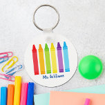 Cute Crayon Elementary School Teacher Personalized Keychain<br><div class="desc">A beautiful Teacher Appreciation Week or End of Year gift for a kindergartener to give to their elementary school teacher. Custom made with a name under the cute rainbow of crayons. An adorable keychain for a preschool teacher.</div>