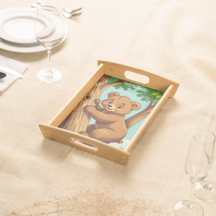 Cute cub bear climbing a tree serving tray