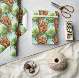 Cute cub bear climbing a tree wrapping paper