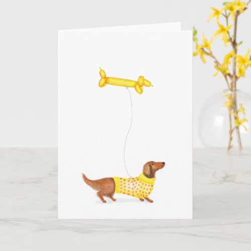 Cute dachshund with sausage dog balloon card