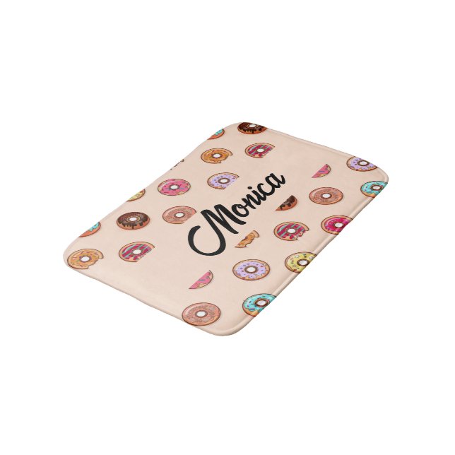 Cute decorative donuts on pink bath mat (Angled)