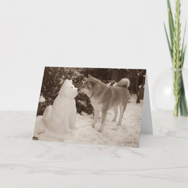 cute dog kissing snowman dog at christmas holiday card (Front)