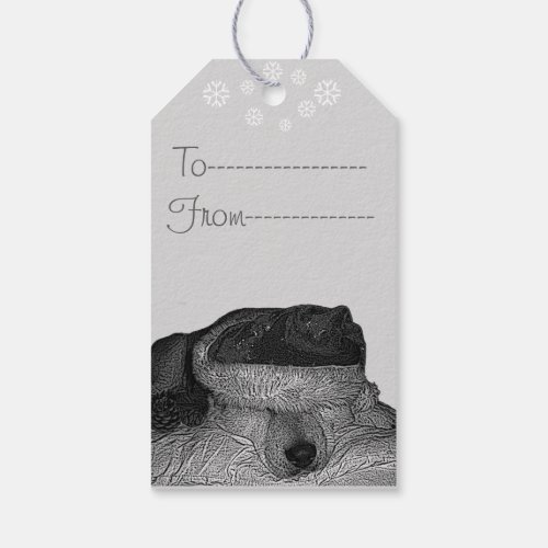 Cute dog wearing santa hat asleeo at christmas dog gift tags