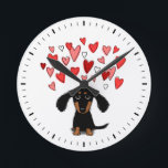 Cute Dog with Hearts Black and Tan Dachshund Round Clock<br><div class="desc">A fun dog wall clock for the home or office. Makes an original gift for black and tan Dachshund lovers. Check out Jenn’s Doodle World for even more decorative clocks and wiener dog themed home decor.</div>