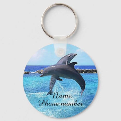 Cute dolphins in the sea keychain