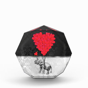 Cute elephant and love heart on gray award