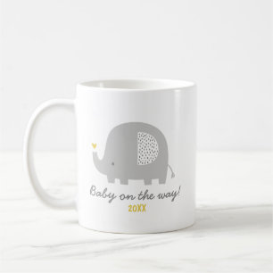 Cute elephant baby on the way + year of birth coffee mug