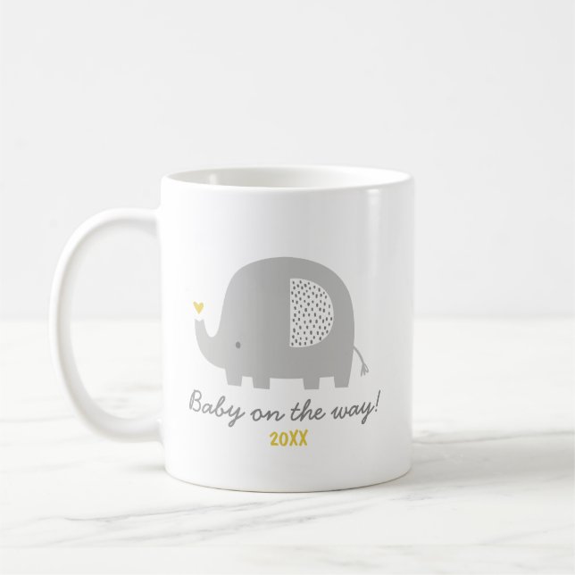 Cute elephant baby on the way + year of birth coffee mug (Left)