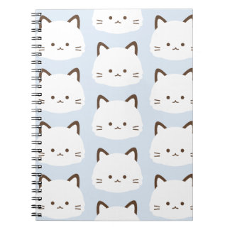 Cute face cat with pastel blue background notebook